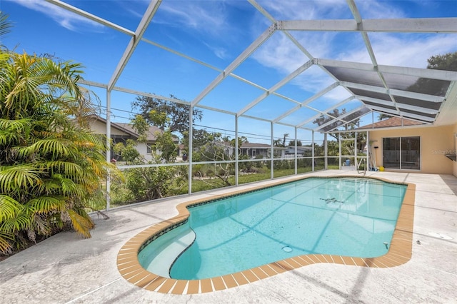 1026 Graham Rd, Venice, FL 34293 - outdoor pool featuring a patio and glass enclosure