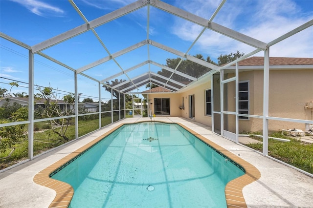 1026 Graham Rd, Venice, FL 34293 - outdoor pool with glass enclosure and a patio
