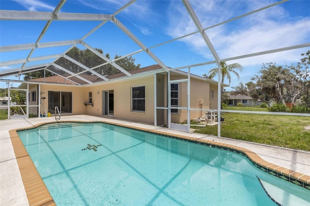 1026 Graham Rd, Venice, FL 34293 - back of property featuring stucco siding, a patio, an outdoor pool, and glass enclosure