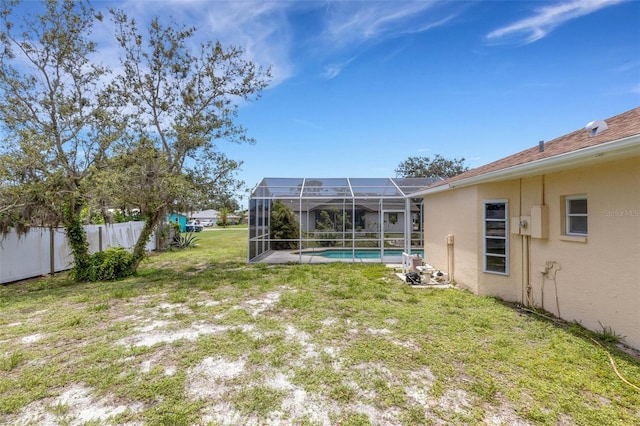 1026 Graham Rd, Venice, FL 34293 - view of yard featuring an outdoor pool and glass enclosure