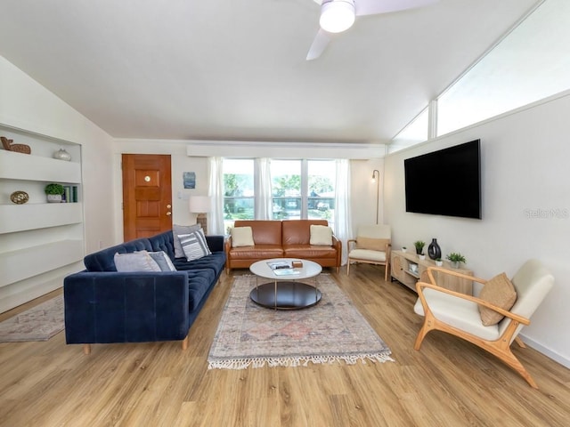 2933 Michigan St, Sarasota, FL 34237 - living area with lofted ceiling, light wood-type flooring, and a ceiling fan