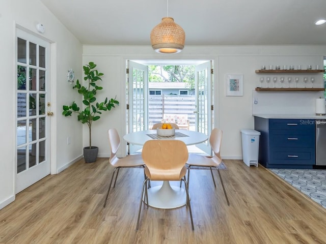 2933 Michigan St, Sarasota, FL 34237 - dining space featuring light wood finished floors