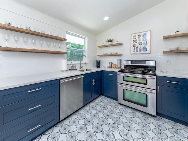 2933 Michigan St, Sarasota, FL 34237 - kitchen with open shelves, stainless steel appliances, blue cabinets, light countertops, and lofted ceiling