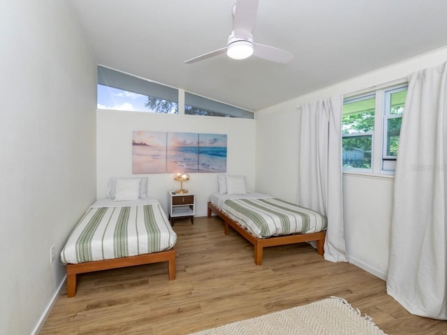 2933 Michigan St, Sarasota, FL 34237 - bedroom with lofted ceiling, wood finished floors, and a ceiling fan