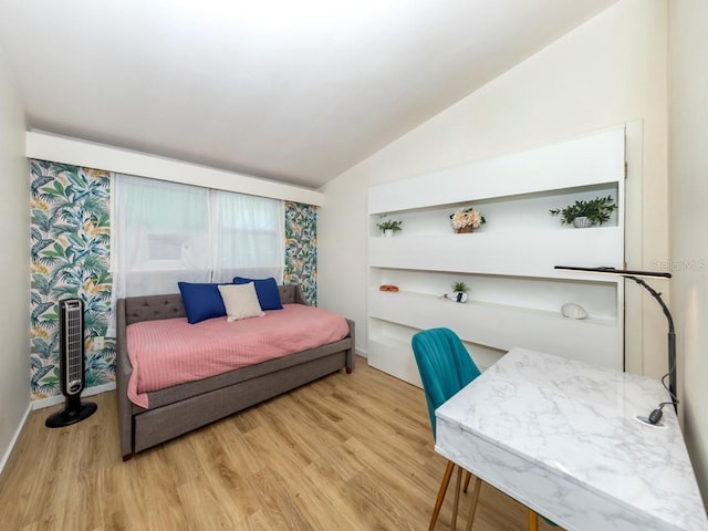 2933 Michigan St, Sarasota, FL 34237 - bedroom featuring vaulted ceiling and wood finished floors