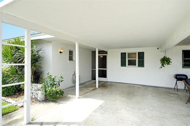 3276 Westford Ln, Sarasota, FL 34231 - view of patio with an attached carport