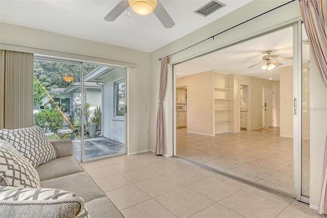 3276 Westford Ln, Sarasota, FL 34231 - living room featuring a ceiling fan and light tile patterned flooring