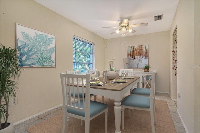 3276 Westford Ln, Sarasota, FL 34231 - dining area featuring ceiling fan and light tile patterned floors