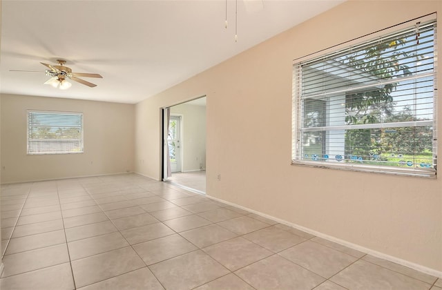 3276 Westford Ln, Sarasota, FL 34231 - spare room featuring ceiling fan and light tile patterned floors