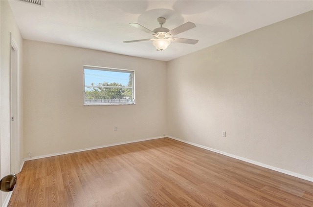3276 Westford Ln, Sarasota, FL 34231 - unfurnished room featuring light wood-style floors and ceiling fan