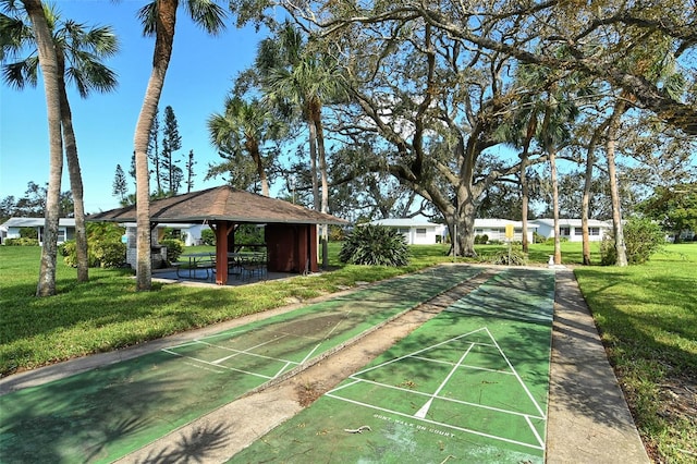 3276 Westford Ln, Sarasota, FL 34231 - view of home's community with a gazebo, a yard, and shuffleboard