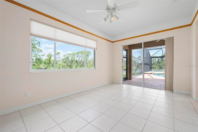 8312 Misty Lake Cir, Sarasota, FL 34241 - unfurnished room featuring healthy amount of natural light, ceiling fan, and light tile patterned flooring