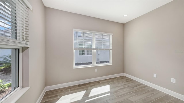 2321 Blue Mahoe Ln, Sarasota, FL 34240 - unfurnished room with wood tiled floors and baseboards