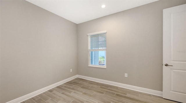 2321 Blue Mahoe Ln, Sarasota, FL 34240 - spare room with baseboards, light wood-type flooring, and recessed lighting