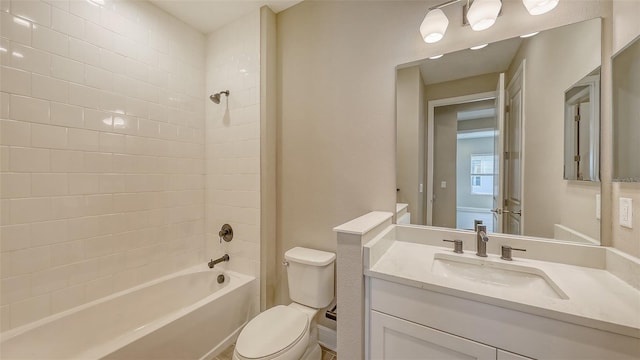 2321 Blue Mahoe Ln, Sarasota, FL 34240 - bathroom featuring toilet, tub / shower combination, and vanity