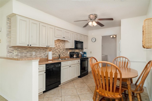 4165 66th Street Cir W Unit H, Bradenton, FL 34209 - kitchen featuring black appliances, a ceiling fan, tasteful backsplash, washer / dryer, and light tile patterned flooring