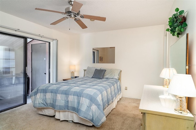 4165 66th Street Cir W Unit H, Bradenton, FL 34209 - bedroom with light carpet, access to outside, and ceiling fan