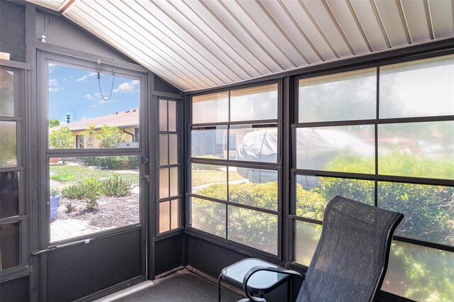 4165 66th Street Cir W Unit H, Bradenton, FL 34209 - unfurnished sunroom featuring vaulted ceiling
