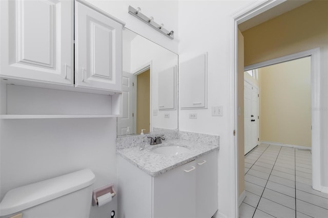 5410 Matthew Ct, Sarasota, FL 34231 - half bath featuring tile patterned floors and vanity