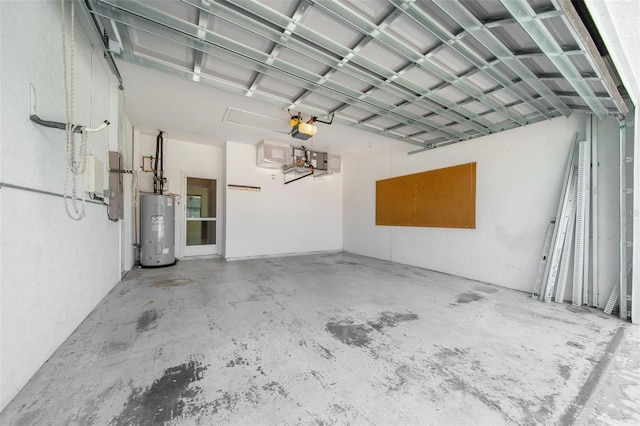 5410 Matthew Ct, Sarasota, FL 34231 - garage featuring electric water heater and a garage door opener
