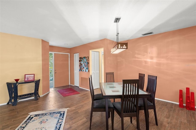 4637 Willow Wood Cir Unit 44, Sarasota, FL 34241 - dining area featuring wood finished floors and lofted ceiling