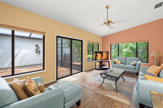 4637 Willow Wood Cir Unit 44, Sarasota, FL 34241 - living area featuring wood finished floors, lofted ceiling, and ceiling fan