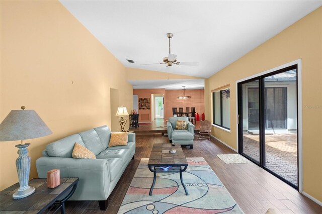 4637 Willow Wood Cir Unit 44, Sarasota, FL 34241 - living area featuring wood finished floors, a ceiling fan, lofted ceiling, and plenty of natural light