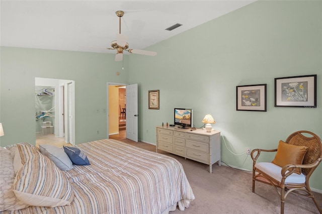 4637 Willow Wood Cir Unit 44, Sarasota, FL 34241 - bedroom with light colored carpet, high vaulted ceiling, and a ceiling fan