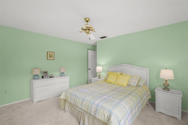 4637 Willow Wood Cir Unit 44, Sarasota, FL 34241 - carpeted bedroom featuring baseboards and a ceiling fan