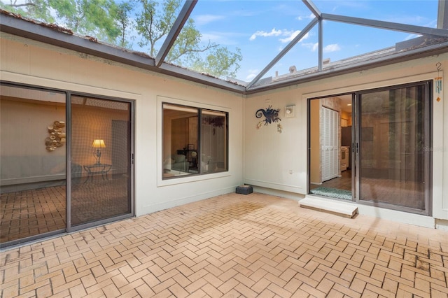 4637 Willow Wood Cir Unit 44, Sarasota, FL 34241 - unfurnished sunroom with vaulted ceiling