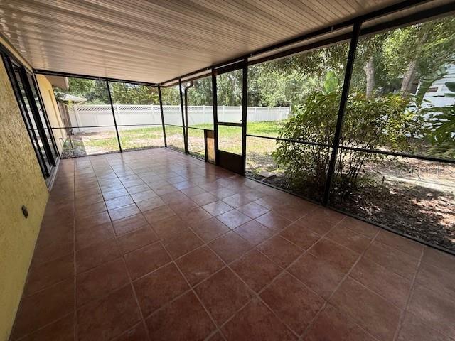 5032 81st Avenue Terrace E, Sarasota, FL 34243 - view of unfurnished sunroom
