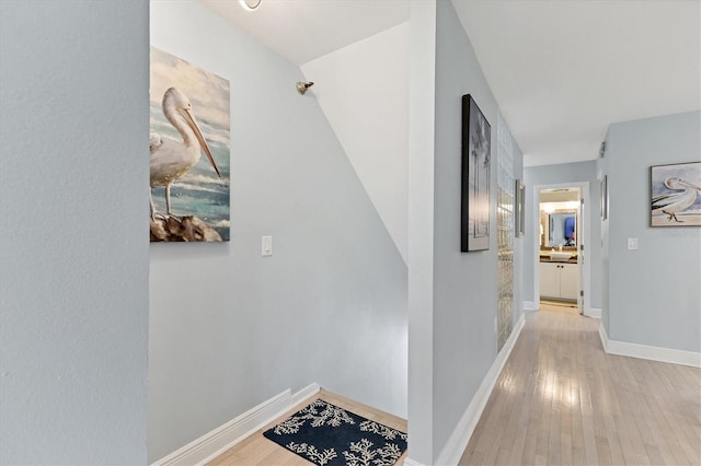 1500 Sunset Rd Unit B4, Tarpon Springs, FL 34689 - hallway featuring light wood-style floors