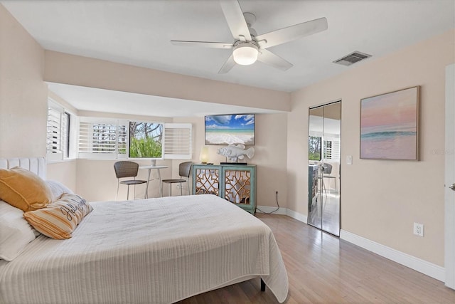 1500 Sunset Rd Unit B4, Tarpon Springs, FL 34689 - bedroom with light wood finished floors and a ceiling fan