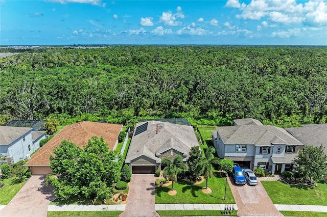 5307 65th Ter E, Ellenton, FL 34222 - aerial perspective of suburban area featuring a heavily wooded area