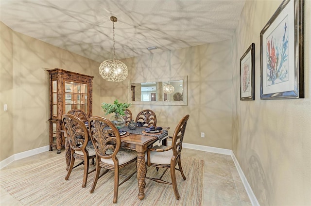 5307 65th Ter E, Ellenton, FL 34222 - dining space with a chandelier and baseboards