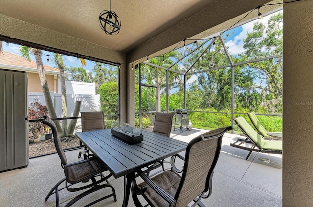 5307 65th Ter E, Ellenton, FL 34222 - sunroom featuring outdoor dining space and view of scattered trees