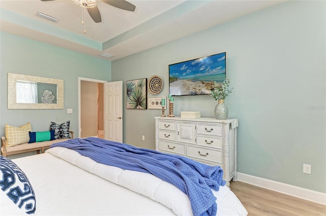 5307 65th Ter E, Ellenton, FL 34222 - bedroom featuring light wood-style floors, baseboards, and ceiling fan