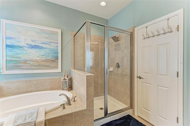 5307 65th Ter E, Ellenton, FL 34222 - full bathroom featuring a garden tub and a shower stall