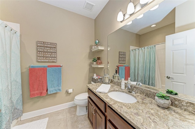 5307 65th Ter E, Ellenton, FL 34222 - bathroom featuring baseboards, vanity, toilet, and a shower with shower curtain
