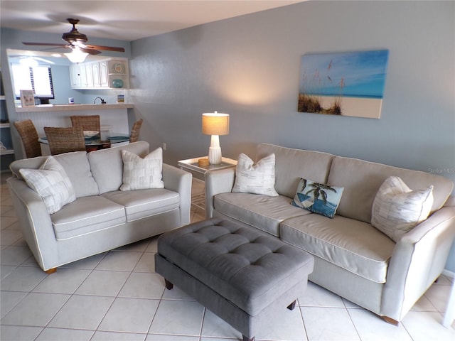 1801 Gulf Dr N Unit 207, Bradenton Beach, FL 34217 - tiled living area with a ceiling fan