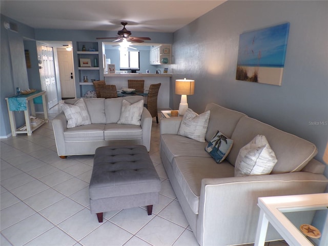 1801 Gulf Dr N Unit 207, Bradenton Beach, FL 34217 - living area featuring ceiling fan and light tile patterned floors