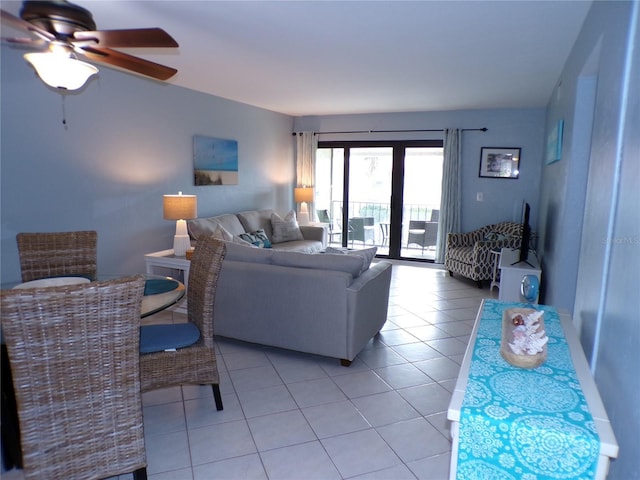 1801 Gulf Dr N Unit 207, Bradenton Beach, FL 34217 - living room with ceiling fan and light tile patterned floors