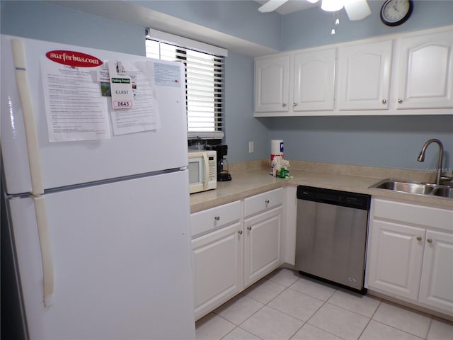 1801 Gulf Dr N Unit 207, Bradenton Beach, FL 34217 - kitchen with white appliances, light tile patterned flooring, white cabinetry, a ceiling fan, and light countertops