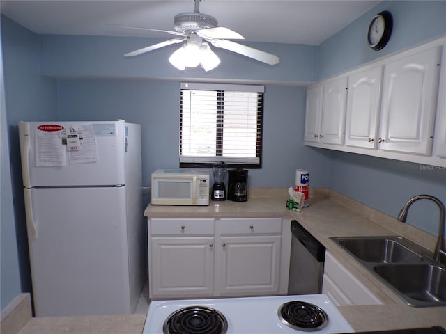 1801 Gulf Dr N Unit 207, Bradenton Beach, FL 34217 - kitchen with white appliances, white cabinetry, ceiling fan, and light countertops