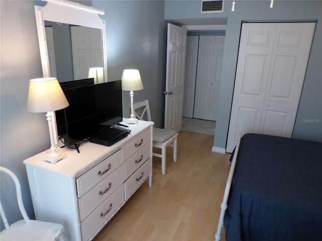 1801 Gulf Dr N Unit 207, Bradenton Beach, FL 34217 - bedroom with light wood-style floors