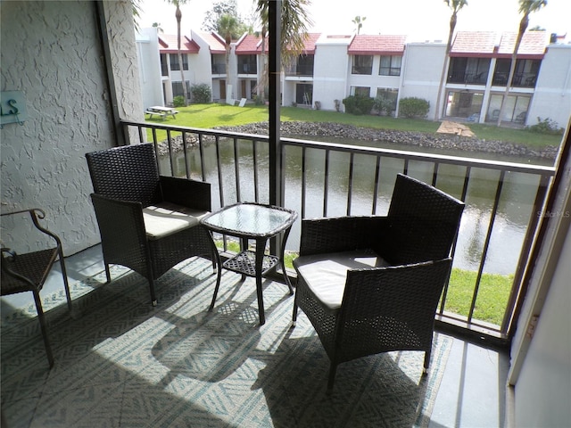 1801 Gulf Dr N Unit 207, Bradenton Beach, FL 34217 - balcony featuring a water view