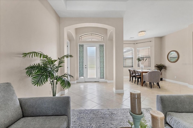 13503 22nd Ct E, Parrish, FL 34219 - foyer with arched walkways and light tile patterned floors