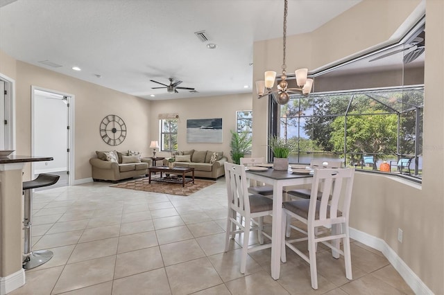 13503 22nd Ct E, Parrish, FL 34219 - dining space featuring ceiling fan, a chandelier, light tile patterned floors, and recessed lighting