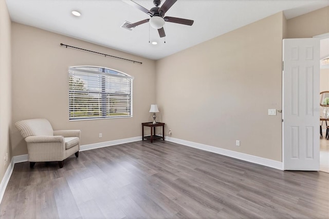 13503 22nd Ct E, Parrish, FL 34219 - living area featuring a ceiling fan, wood finished floors, and recessed lighting