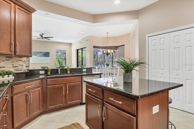 13503 22nd Ct E, Parrish, FL 34219 - kitchen featuring light tile patterned floors, dishwasher, a ceiling fan, recessed lighting, and tasteful backsplash
